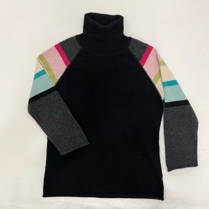Cashmere turtleneck with multi coloured sleeves
